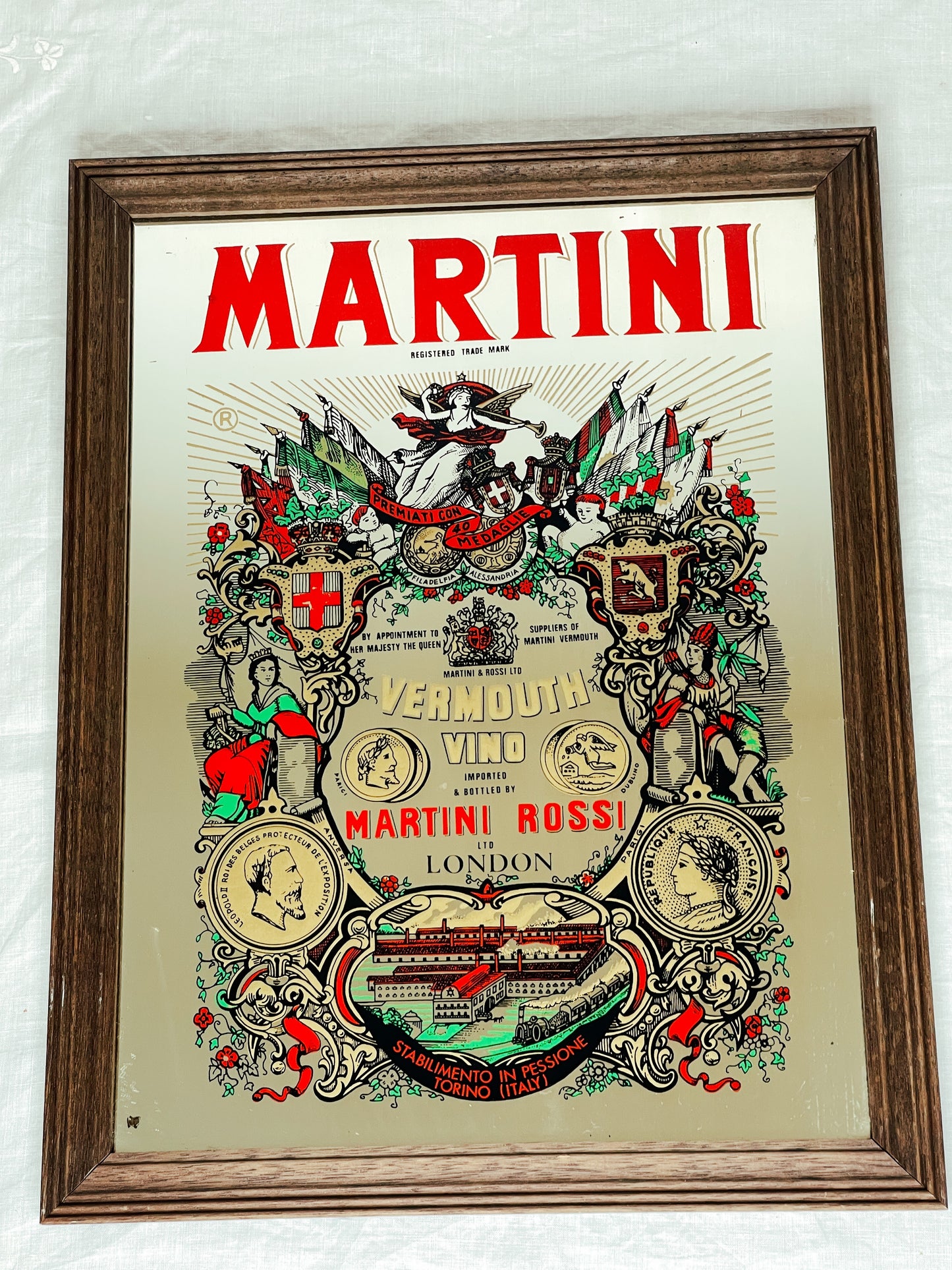 Martini Vermouth Vino advertising mirrored sign.